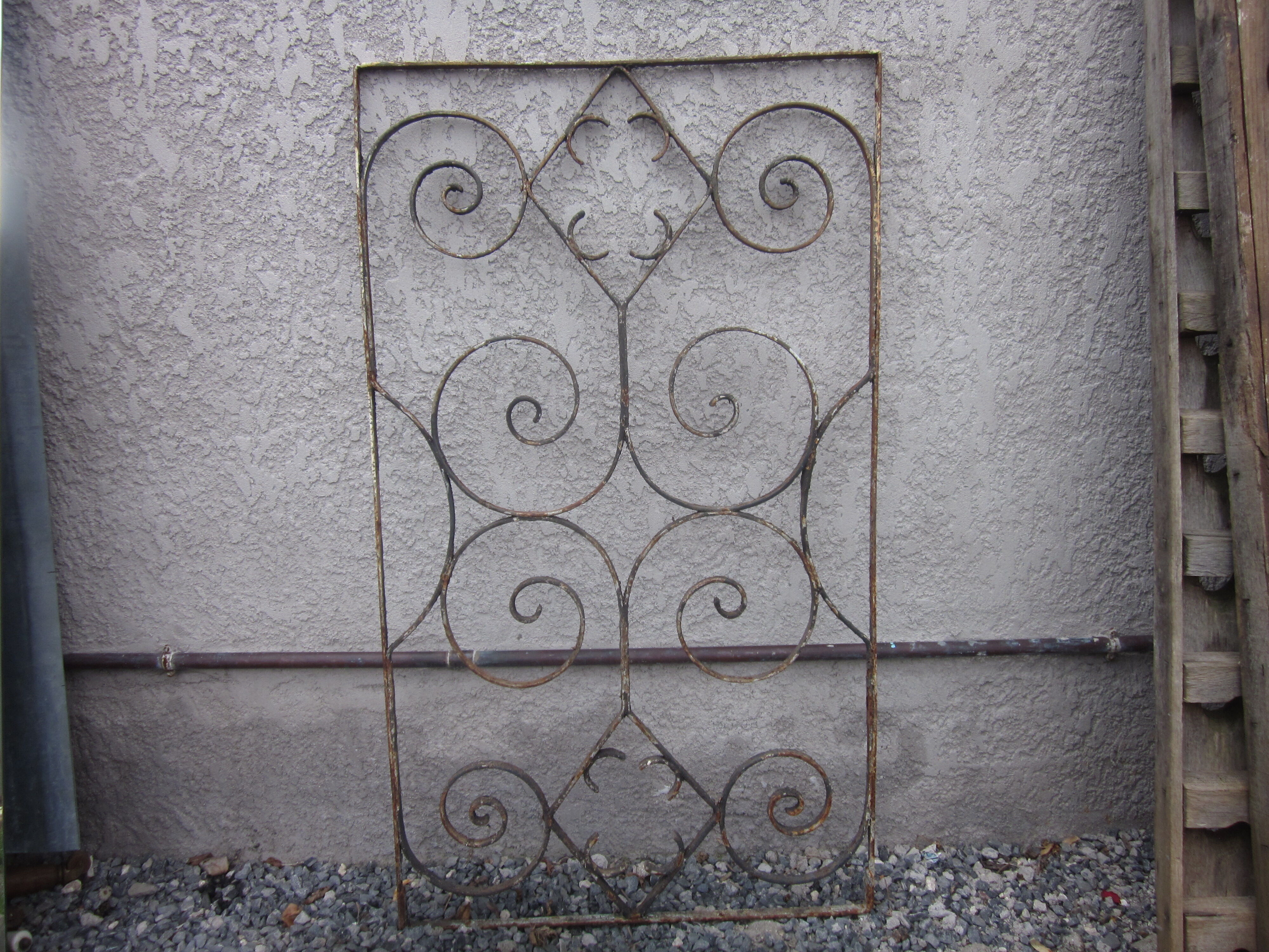 old wrought iron grid