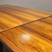 Teak dining table designed by Henning Kjaernulf and manufactured 60 years