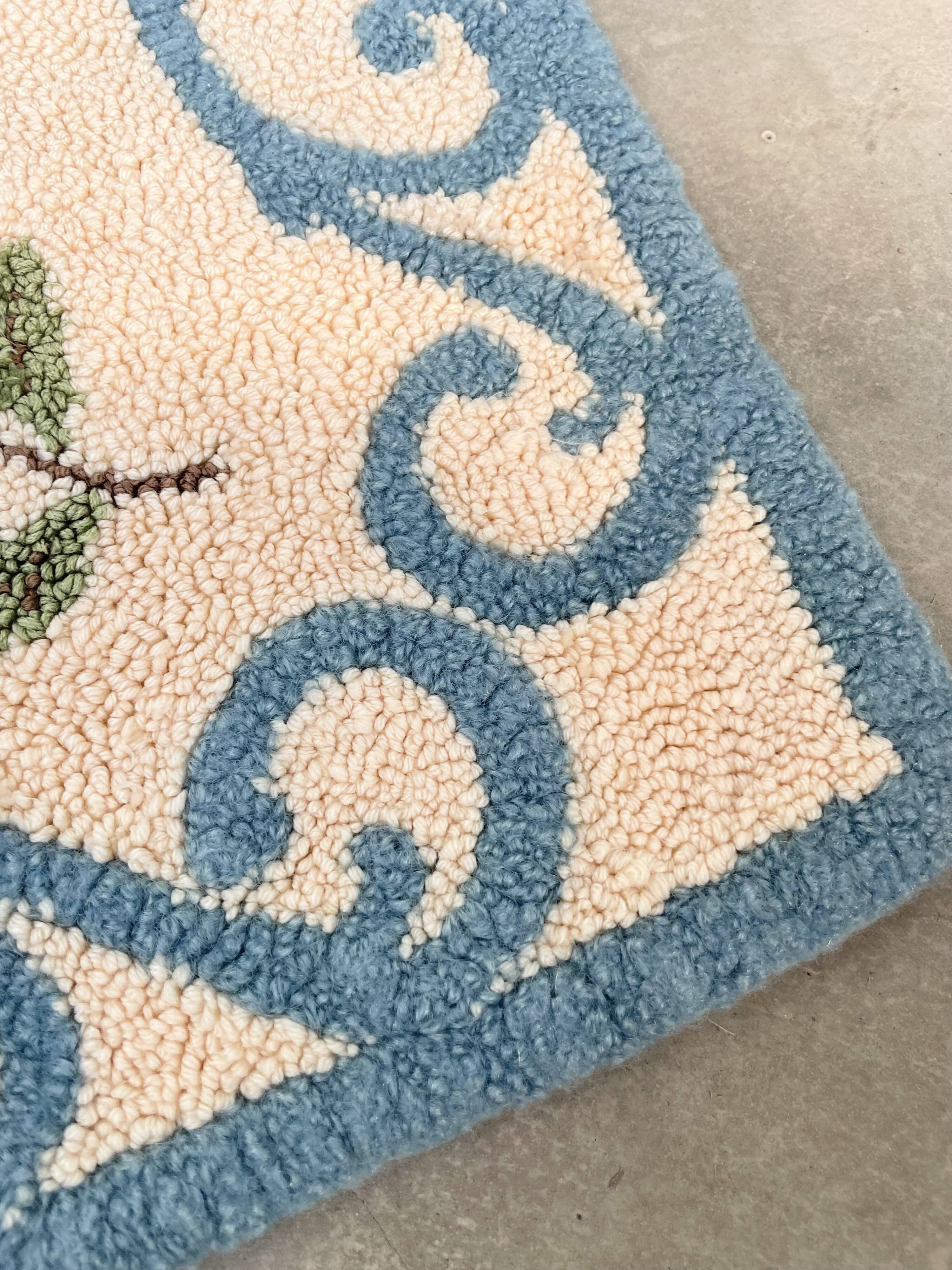 White and blue floral wool rug