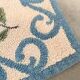 Tapis en laine blanc et bleu fleuri