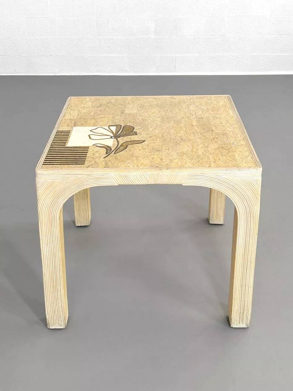 1970s rattan table with stone marquetry and matching chairs.