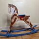 Old rocking horse in painted wood, 50s