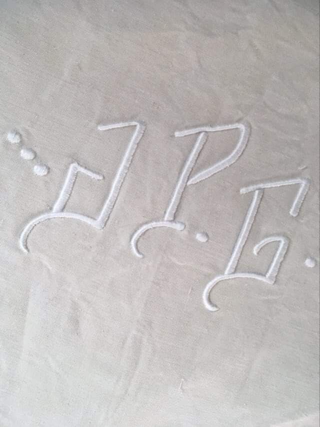 Mixed-race sheet with JPG monogram.