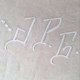 Mixed-race sheet with JPG monogram.