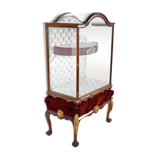 Mahogany jeweler's showcase with gilded bronze legs