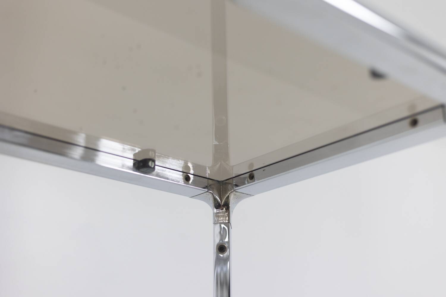 Pair of 6-shelf shelves with chrome-plated metal frames. 1970s.