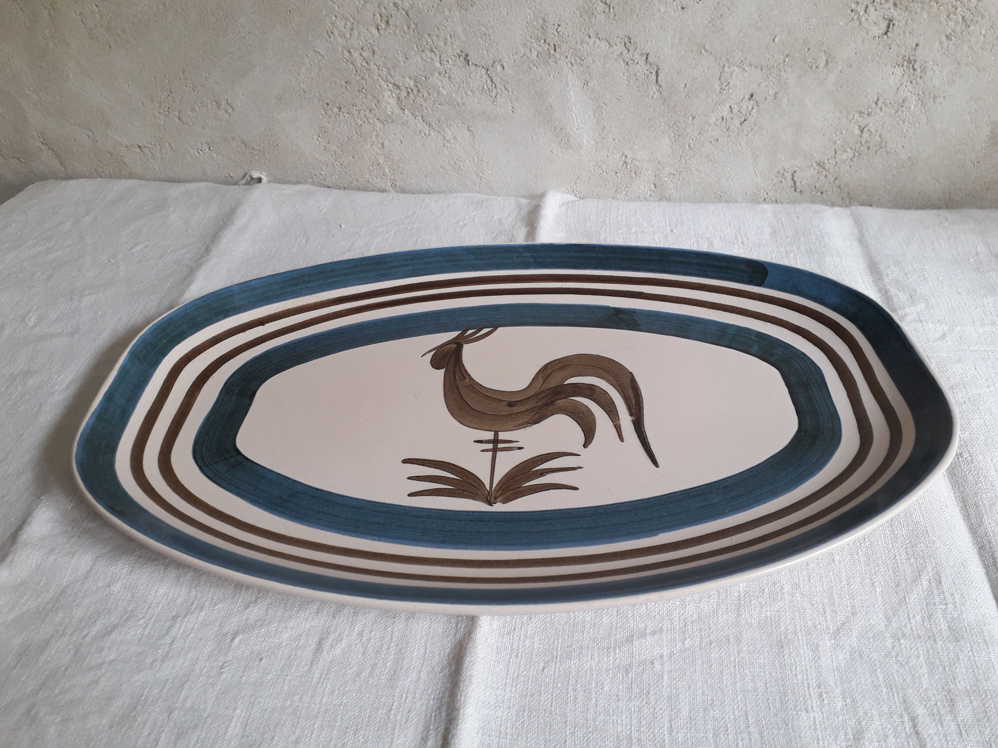 Longchamp sandstone dish with 70s rooster decorations