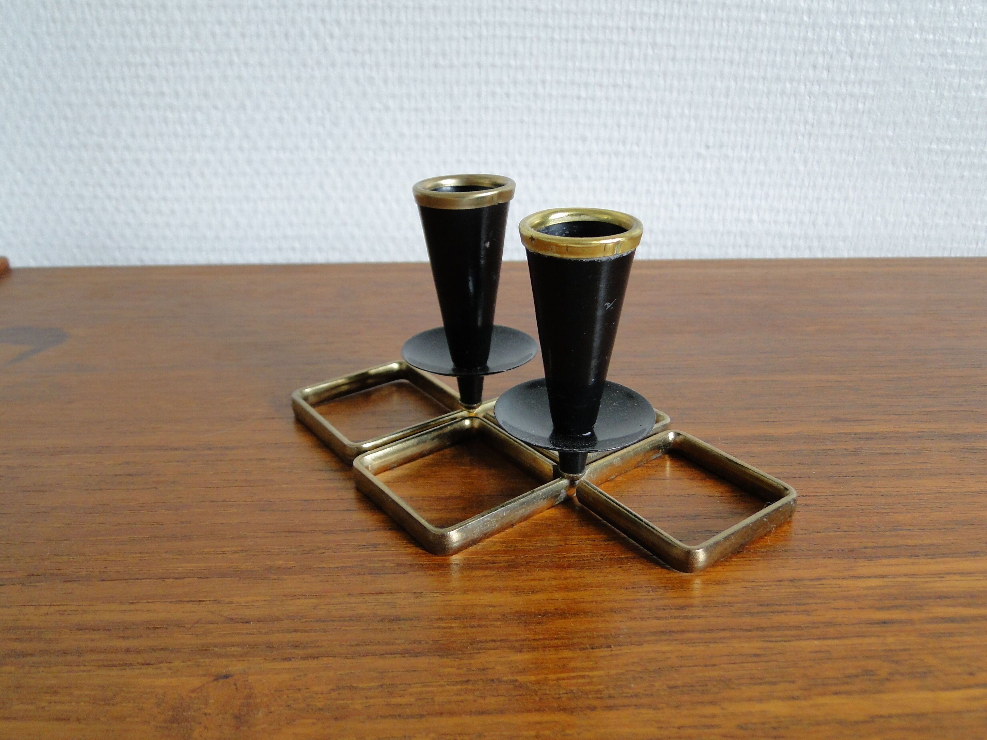 Pair of vintage candle holders in black metal and brass Sweden 1960