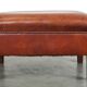 Leather ottoman in classic English style finished with decorative nails