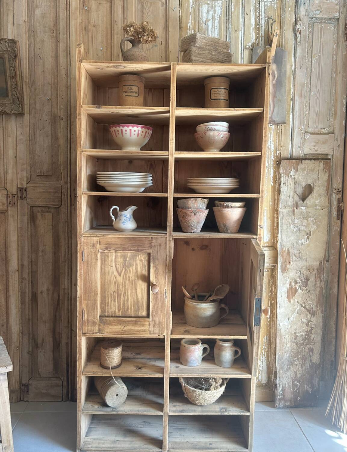 Antique workshop cabinet with compartments and doors