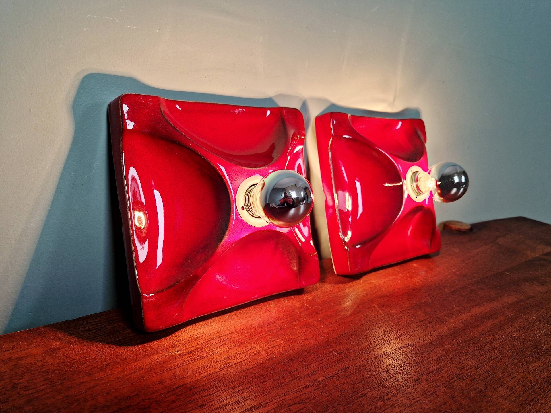 Pair of Space Age wall sconces in red ceramic, 1970.