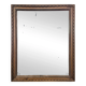 Miroir Napoléon III à cadre en bois sculpté et doré