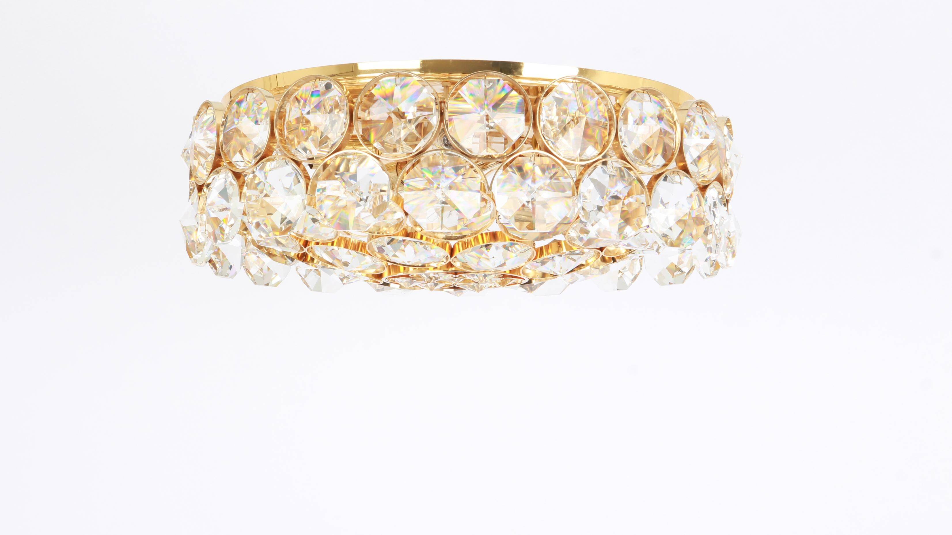 Chandelier in gilded brass and crystal glass inlaid by Palwa, Germany, 1970s.