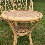 Set of children's rattan garden furniture from the 1950s and 1960s, including chairs, table, and bench.