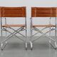 1970s pair of Italian folding chairs with leatherette upholstery