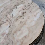 Round coffee table in wrought iron and on marble