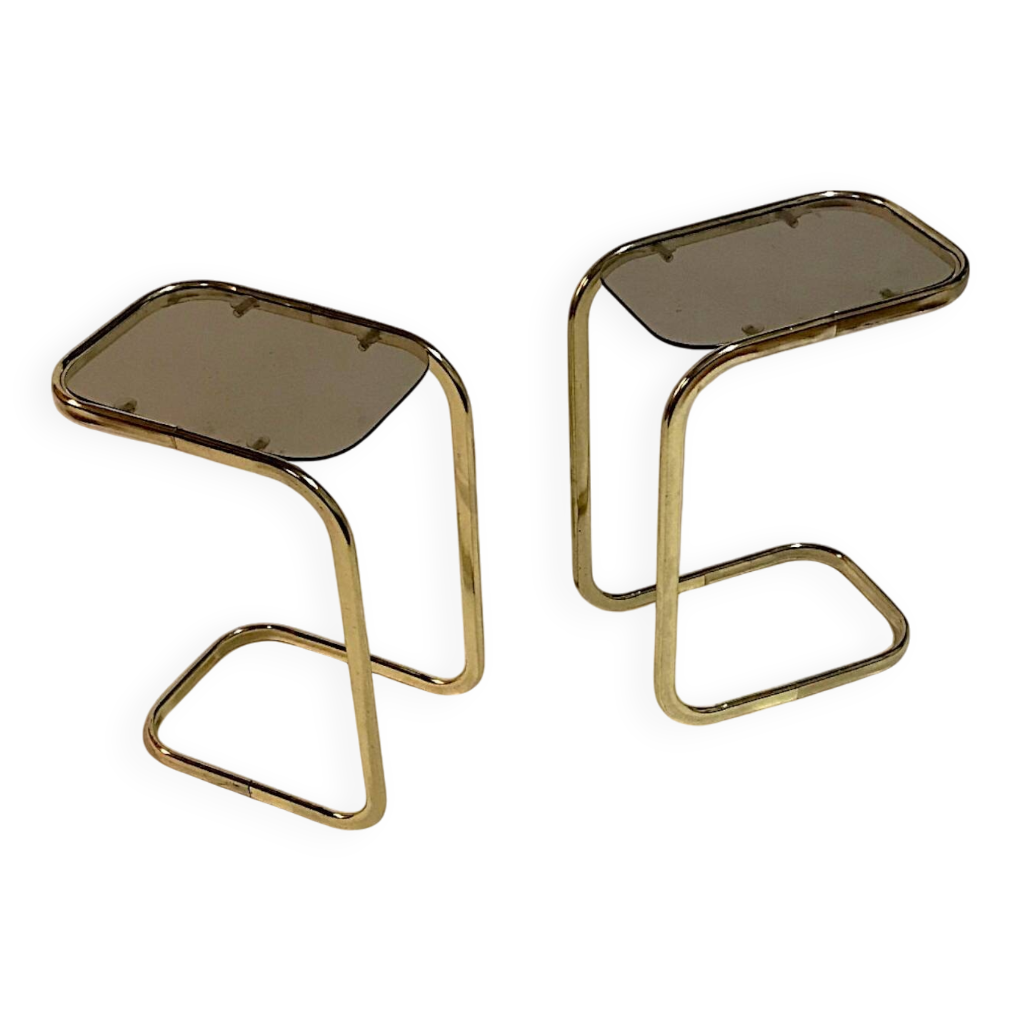 C. 1970 - Pair of side tables in gilded metal and smoked glass -