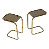 C. 1970 - Pair of side tables in gilded metal and smoked glass -
