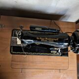 Singer sewing machine in its cabinet