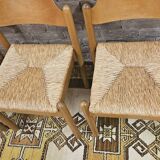 4 chaises en paille dans le style Charlotte Perriand 1970 vintage