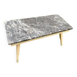 Coffee table with compass legs