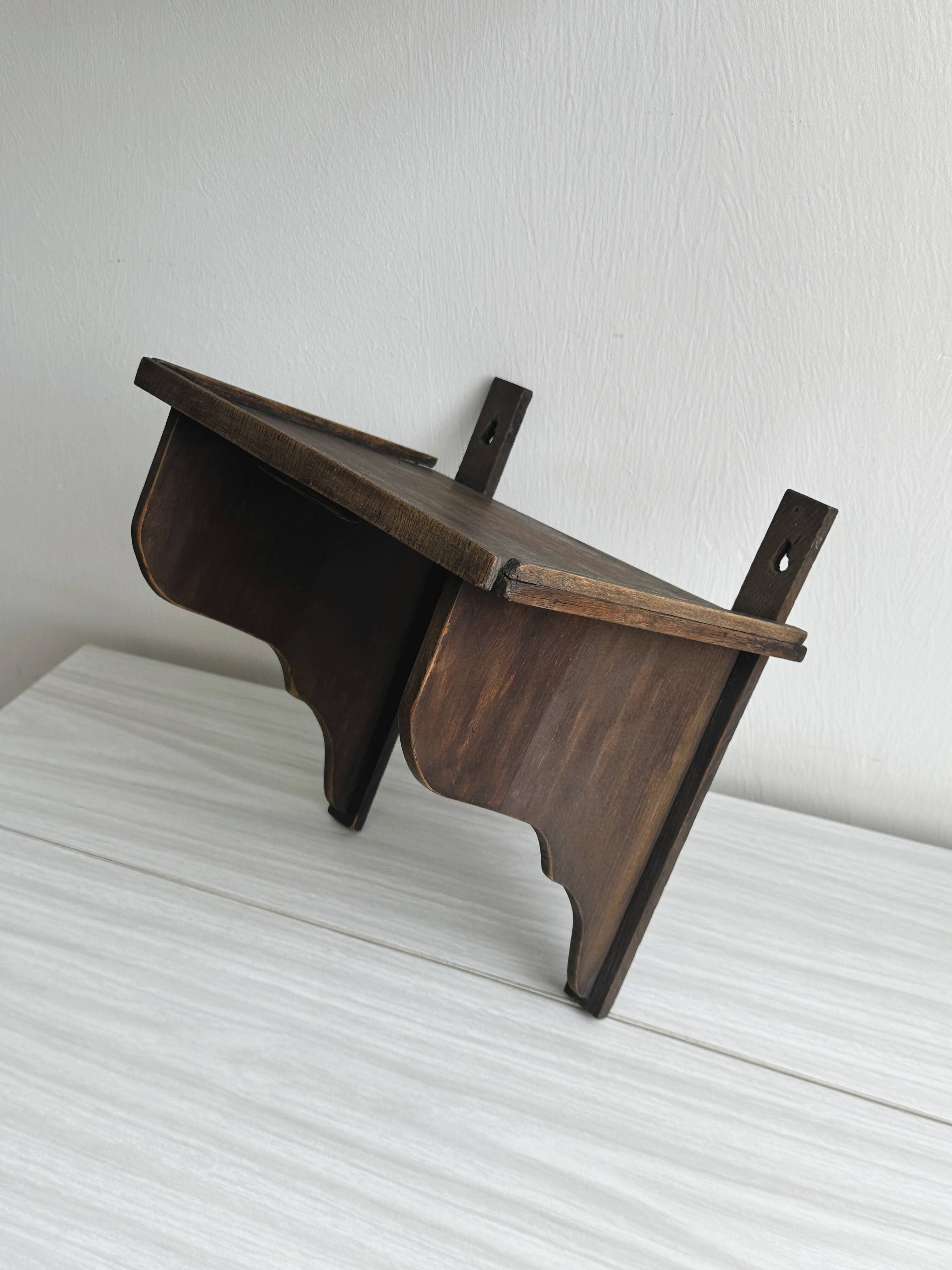 Antique wooden wall shelf.