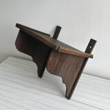 Antique wooden wall shelf.