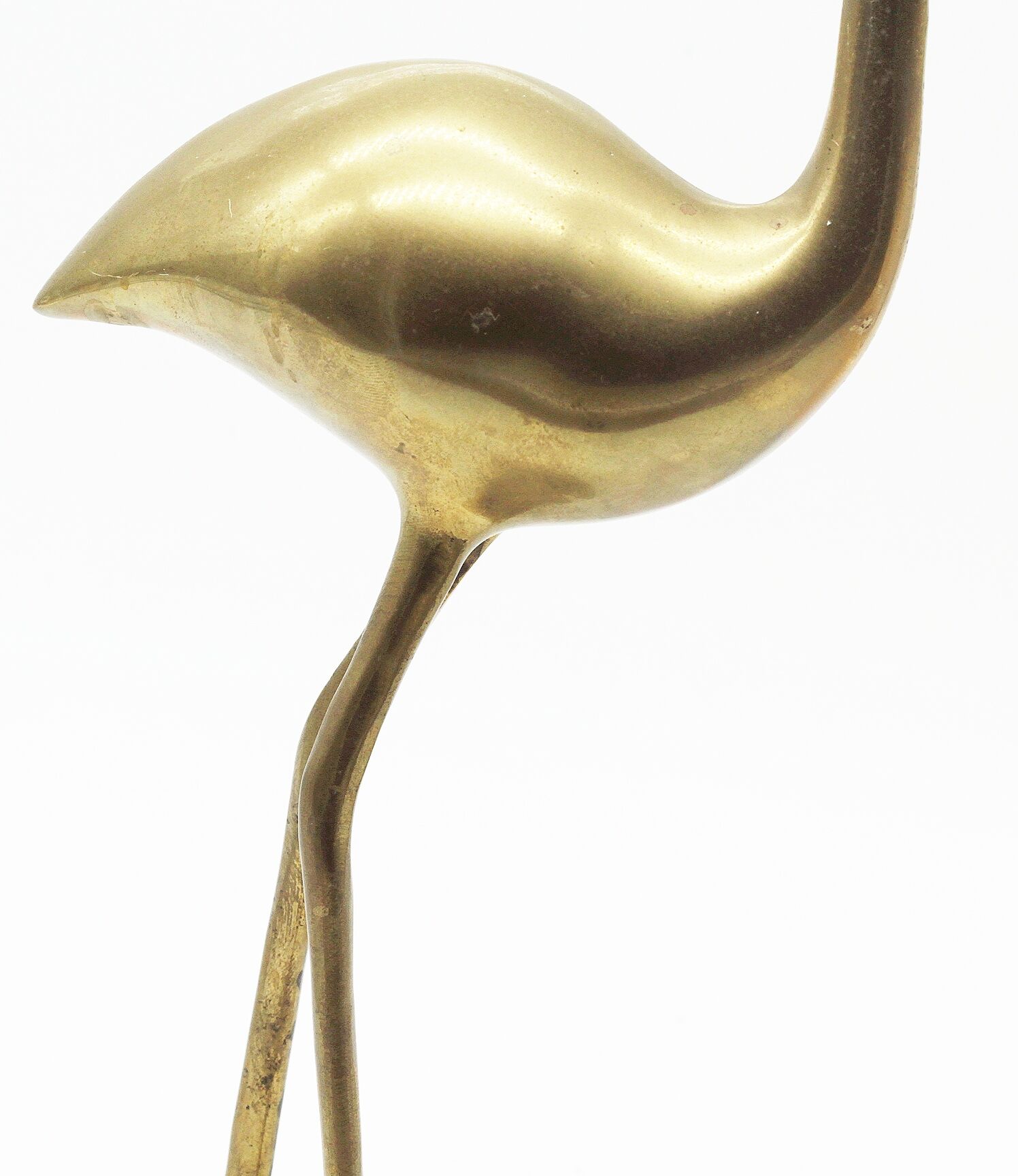 Brass heron statue