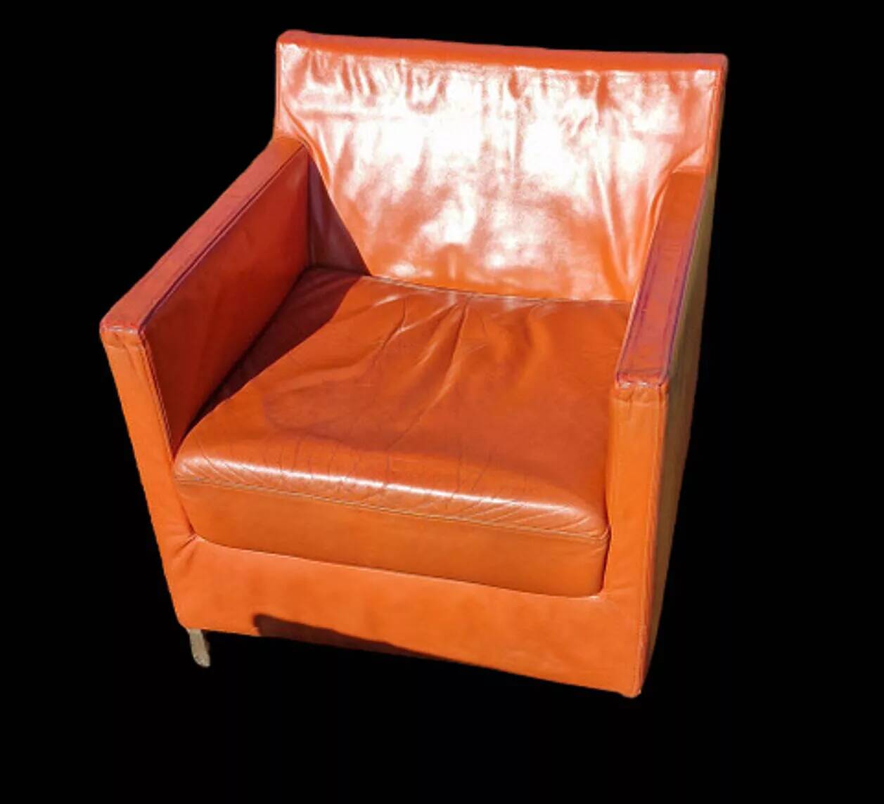 Pair of orange leather club chairs 1980