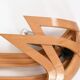 Vincent Gonzalez: sculpted curved wood wall light, 1970s design