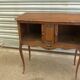 Piece of furniture with two Louis XV-style curtains.