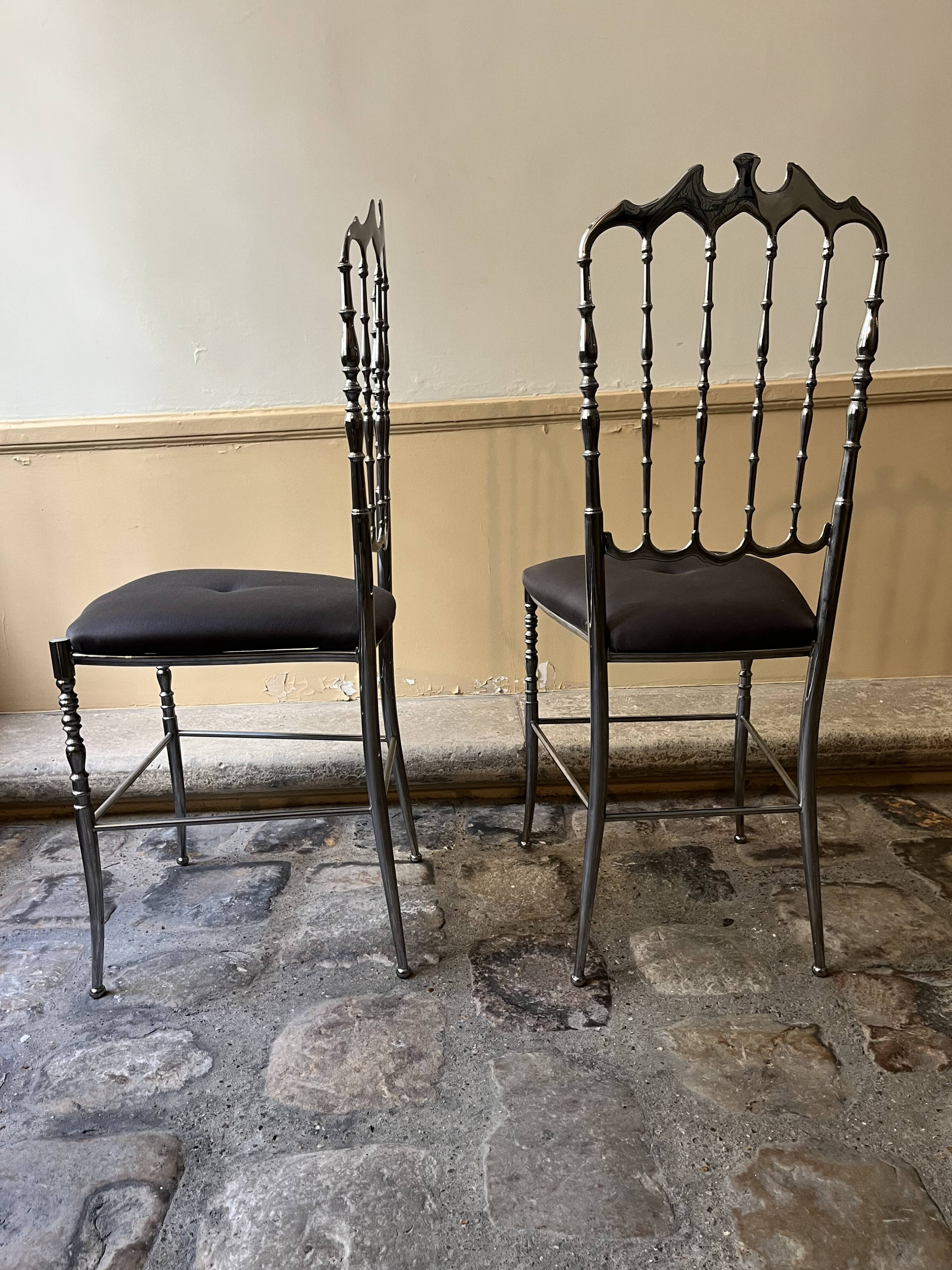 Pair of Chiavari chairs in polished mirror aluminium.