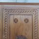 Corner cabinet in carved walnut, Savoyard style.