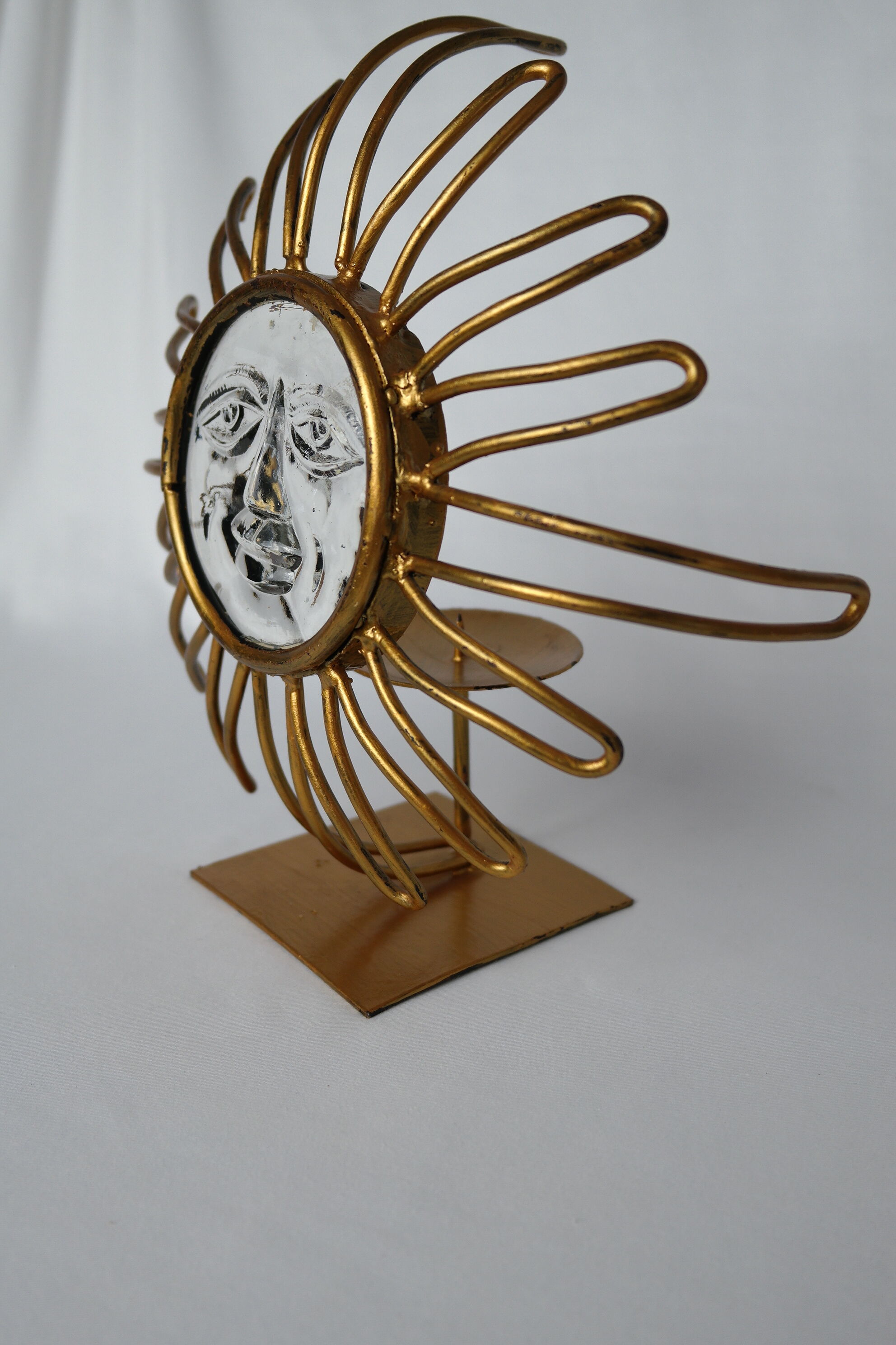 Vintage sun candlestick