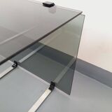 Vintage coffee table in smoked glass, black metal and cast aluminum