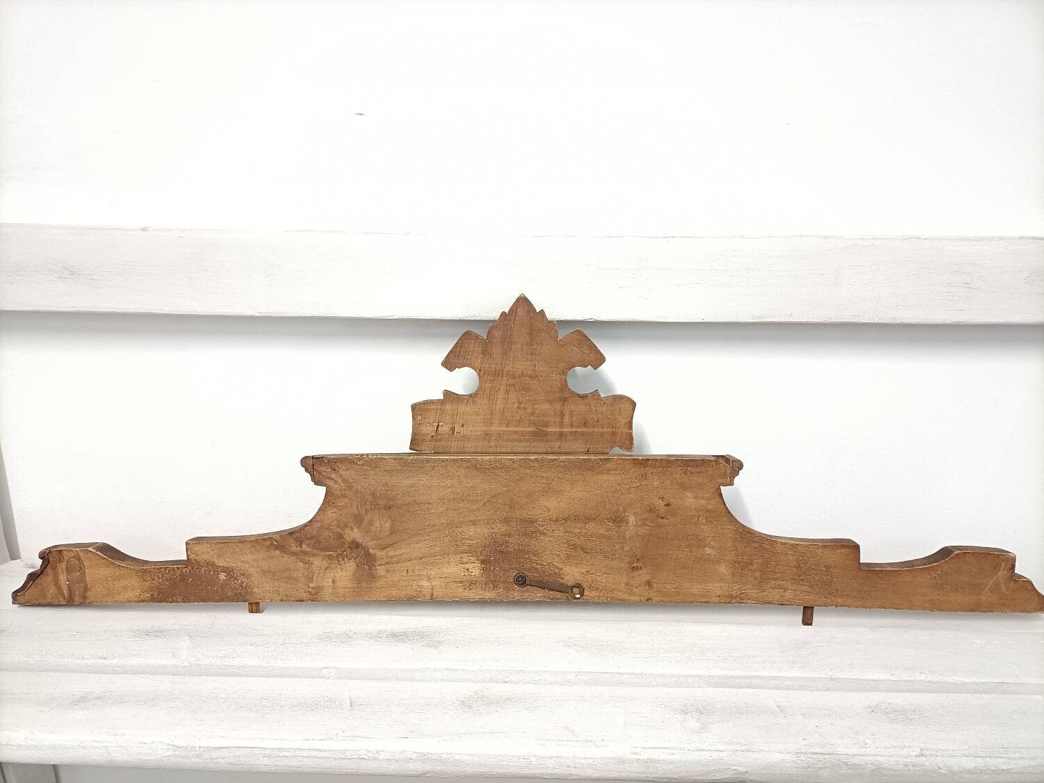 Antique carved wooden door pediment