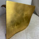 Small corner console in resin with a gold finish.
