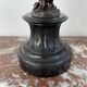 Candelabra with cherub in patinated bronze
