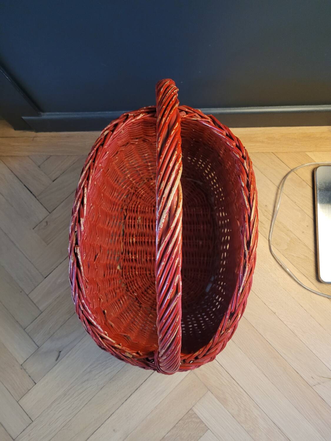 Red painted rattan basket