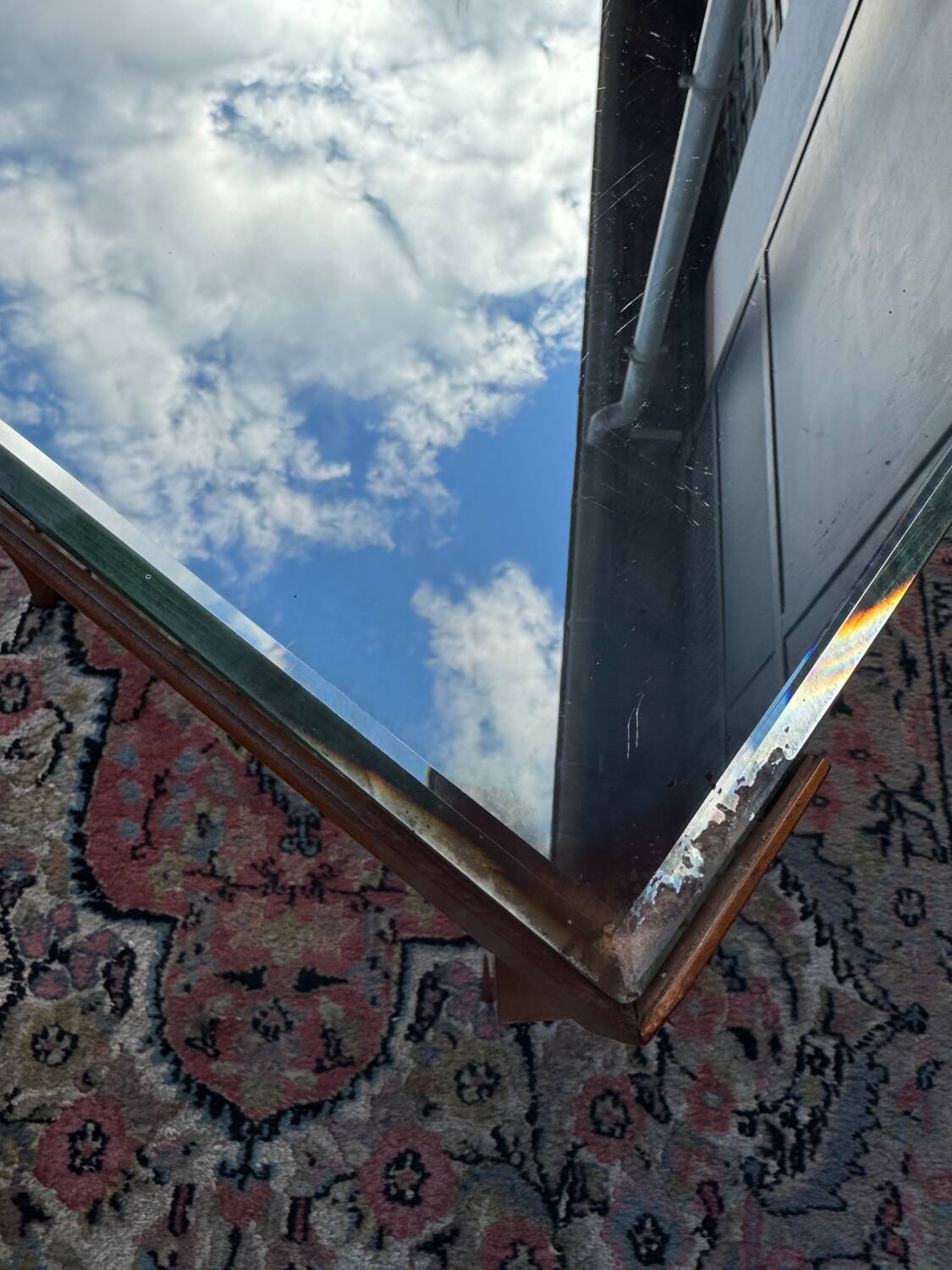 Small wooden coffee table with a mirror from the 1950s.