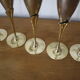 5 metal and brass champagne flutes