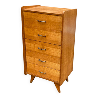 Scandinavian oak chest of drawers with tapered legs from the 1950s.