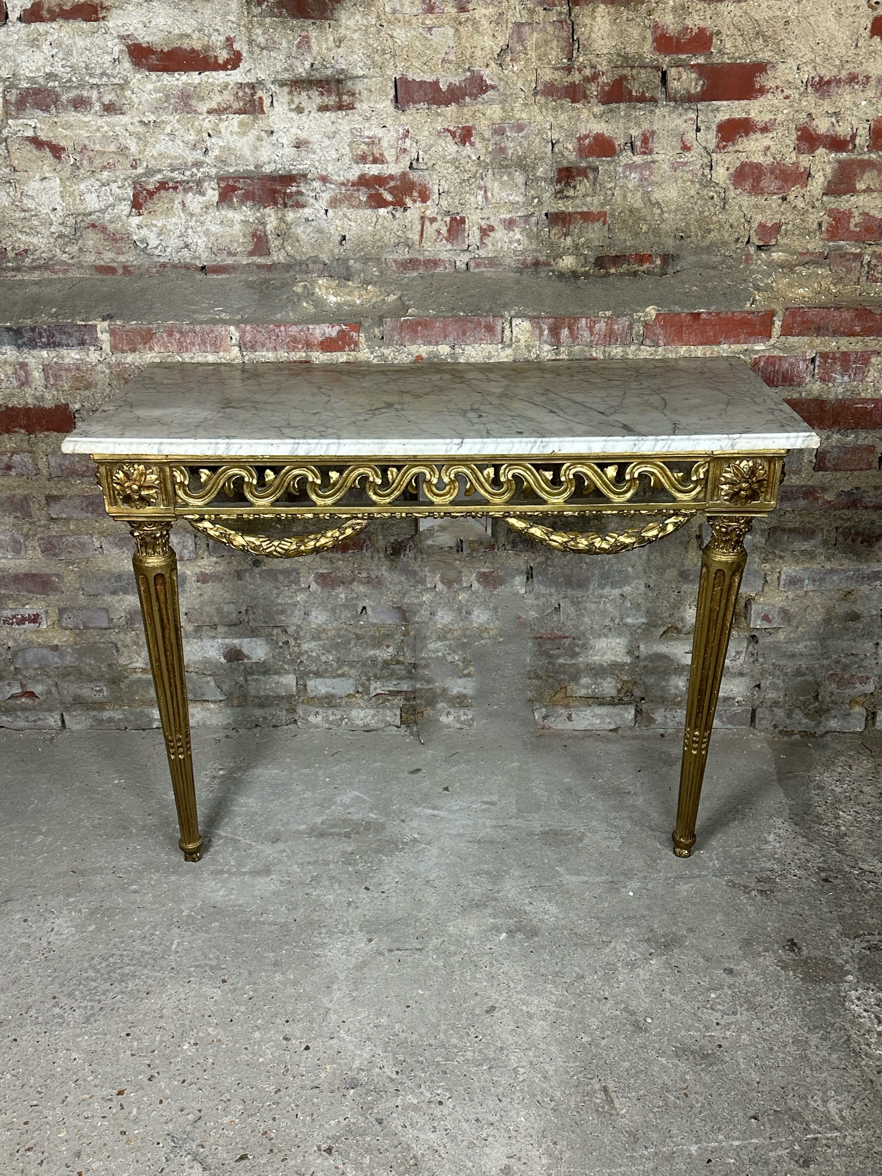 Louis XVI style console in carved wood eighteenth