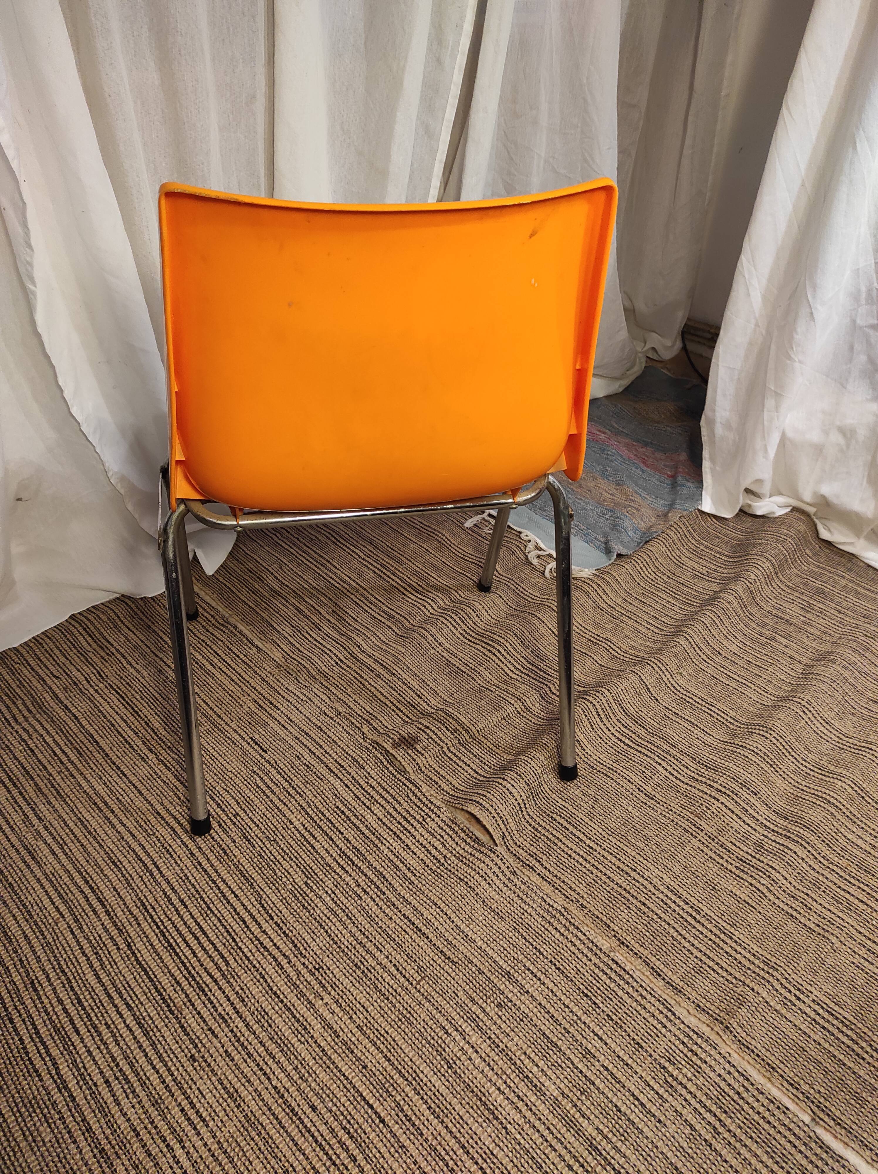 Orange plastic chair 1970