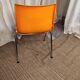 Orange plastic chair 1970