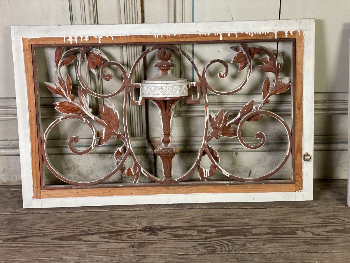 Pair of cast iron window shutters in Louis XVI style.