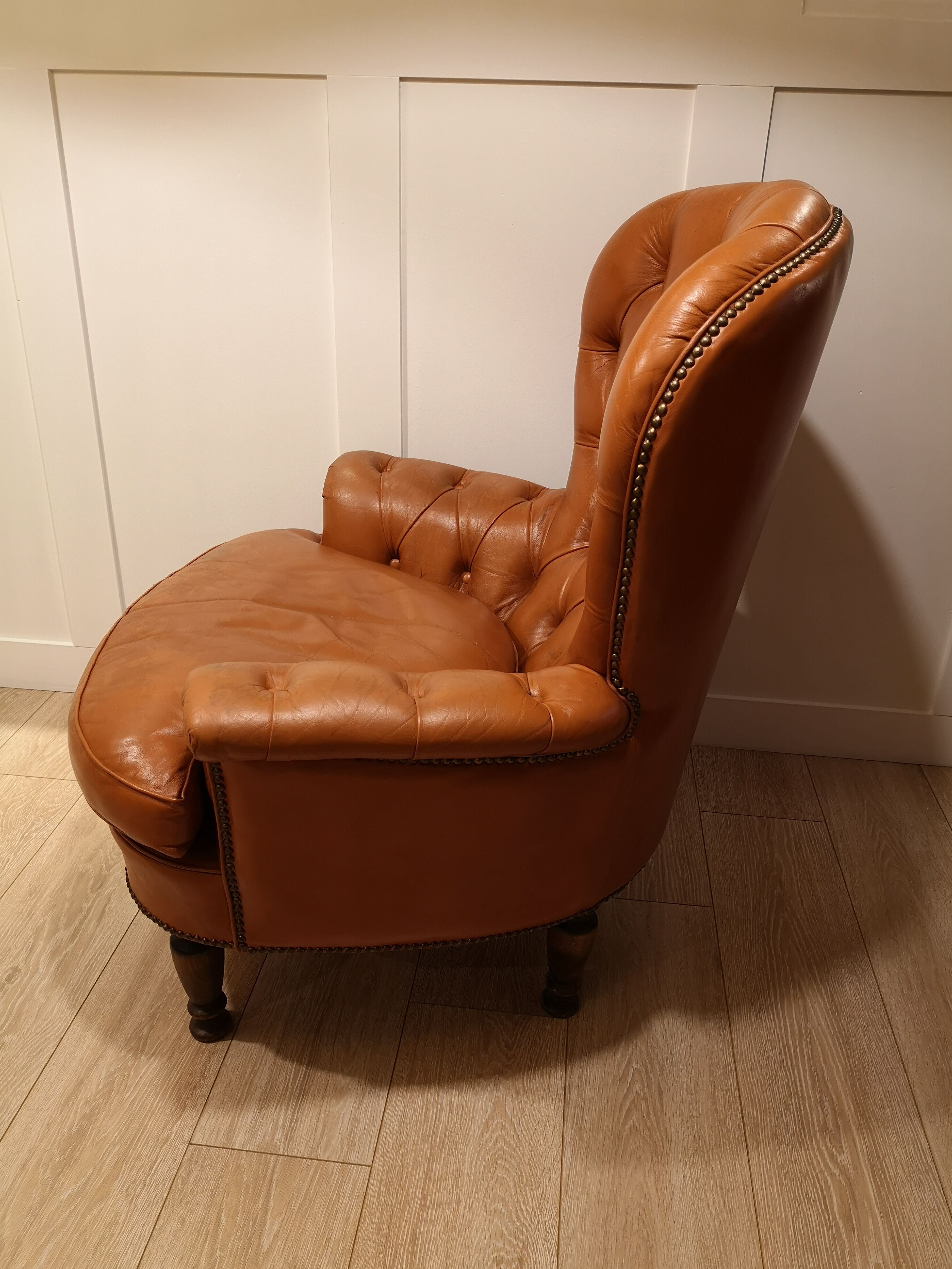 Pair of leather chesterfield chairs