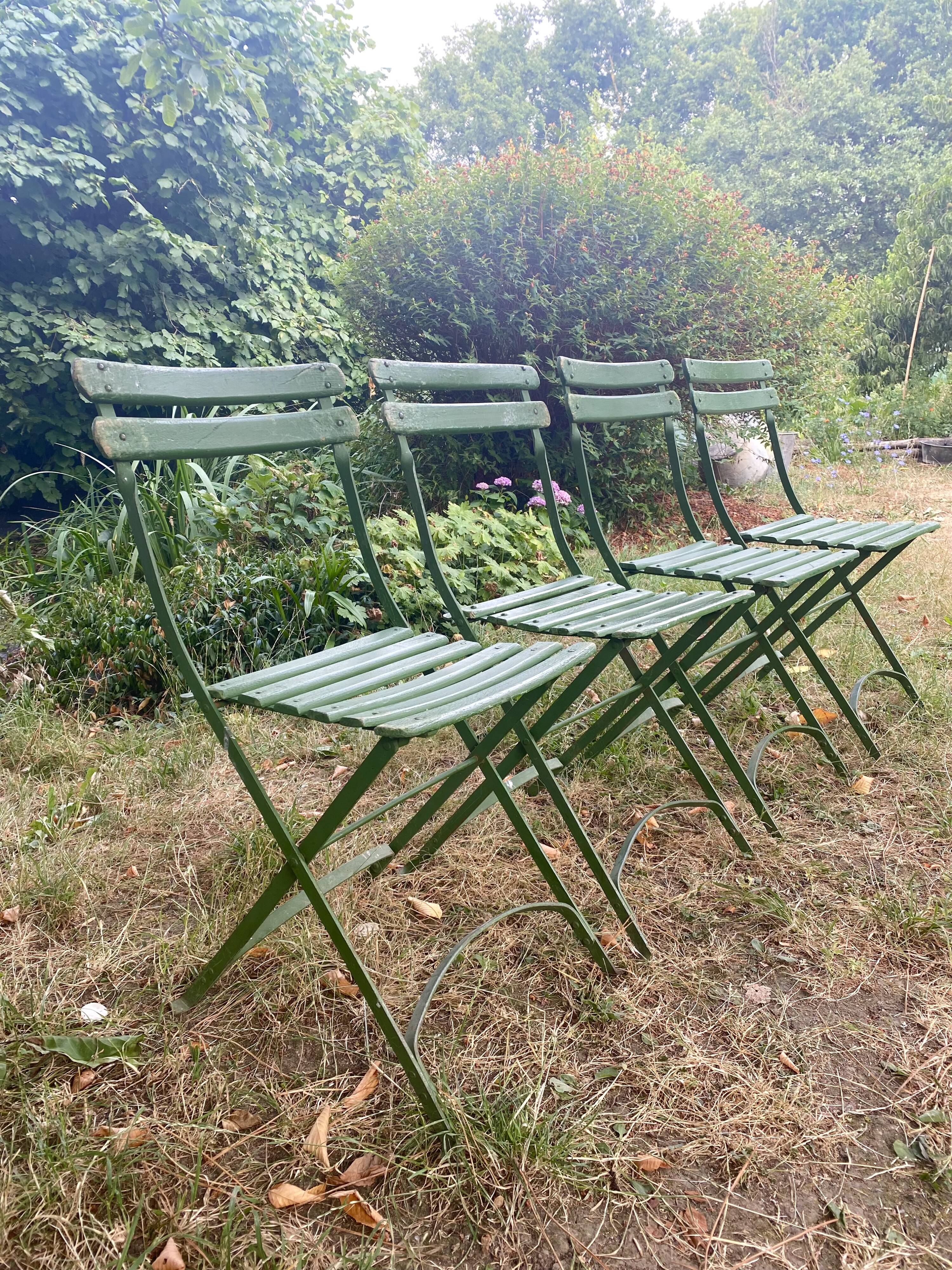 Antique folding garden chairs with wooden slats