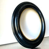 Black wooden oval frame