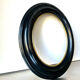 Black wooden oval frame